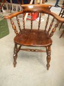 A good old spindle back kitchen arm chair,