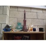A selection of coloured glass vases, bowls, ornaments etc.