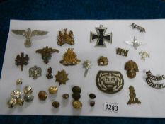 A mixed lot of medals and badges.