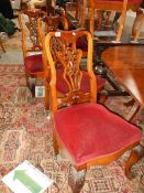 A set of 7 good ball and claw mahogany chairs.