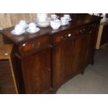 An inlaid mahogany veneered sideboard