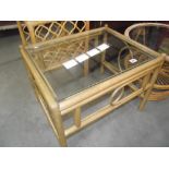 A glass top bamboo table
