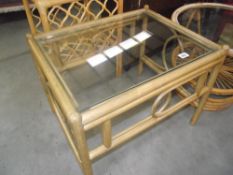 A glass top bamboo table