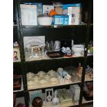 4 shelves of kitchen ware.