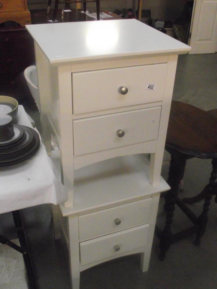 2 white melamine bedside chest of drawers