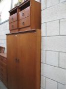 A matching Avalon bedroom wardrobe and pair of bedside cabinets