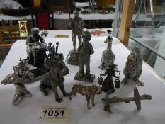 A mixed lot of metal figures including lace maker, soldier, dogs, ducks etc.