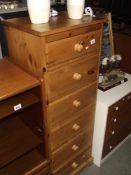 A tall narrow soild pine 6 drawer chest of drawers