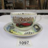 A Royal Worcester classic sports cars large tea cup and saucer.