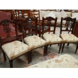 A set of 4 dining chairs.