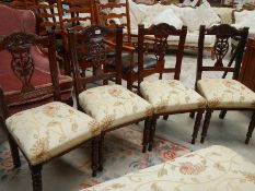 A set of 4 dining chairs.