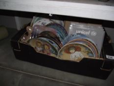 A box of assorted collectors plates (some boxed)