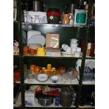 4 shelves of kitchenware including some new items.