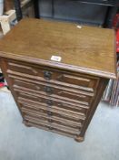 A 6 drawer oak chest.