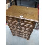 A 6 drawer oak chest.