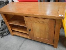 A solid oak wall unit.