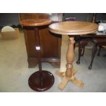 A round varnished wood pot stand and a side table