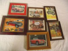 A quantity of fra,ed advertising prints of classic cars and motorbikes including Austin Healey,