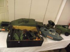 Three boxes containing various Action Man/Cherolee vehicles and accessories