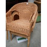 2 cane conservatory chairs.