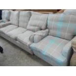 A 3 seater sofa and 2 matching chairs.