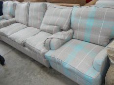 A 3 seater sofa and 2 matching chairs.