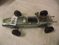 A tinplate clockwork Schuci 1072 BMW Formula 2 racing car