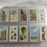 An album of cigarette cards including Wills etc