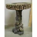 A branch style concrete bird bath, 26".