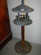 A metal Chinese style bird house, 36" tall.