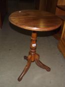 A Victorian mahogany tripod side table