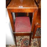 A music stool and a side table.