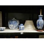 A mixed lot of blue and white including pumpkin jar and table lamp.
