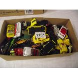 Box containing various die-cast toys