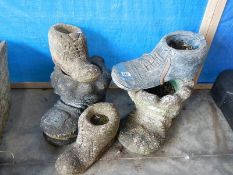 5 concrete boot shape garden planters.