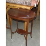 An Edwardian mahogany side table