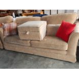 A large 3 seater sofa and stool.