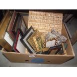 A box containing a wicker basket and quantity of picture frames etc.