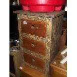 A shabby chic chest of drawers with pine front