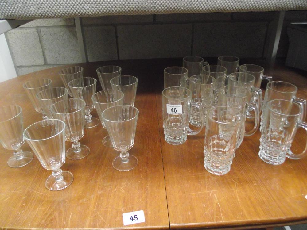 A dozen vintage 1/2 pint beer glasses and 10 wine glasses