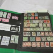 Am album of pre and post war German stamps including mint blocks Hitler and NAZI stamps and good