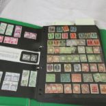 Am album of pre and post war German stamps including mint blocks Hitler and NAZI stamps and good