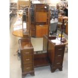 An Art Deco style dressing table with cheval central mirror and 2 side mirrors
