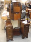 An Art Deco style dressing table with cheval central mirror and 2 side mirrors