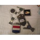 A quantity of vintage / classic car badges including Fire Service Personel,