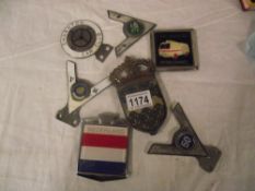 A quantity of vintage / classic car badges including Fire Service Personel,