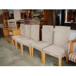 A set of 6 oyster dining chairs.