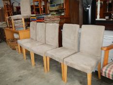 A set of 6 oyster dining chairs.