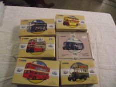 Six boxed Corgi Classics toy bus models