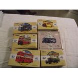 Six boxed Corgi Classics toy bus models